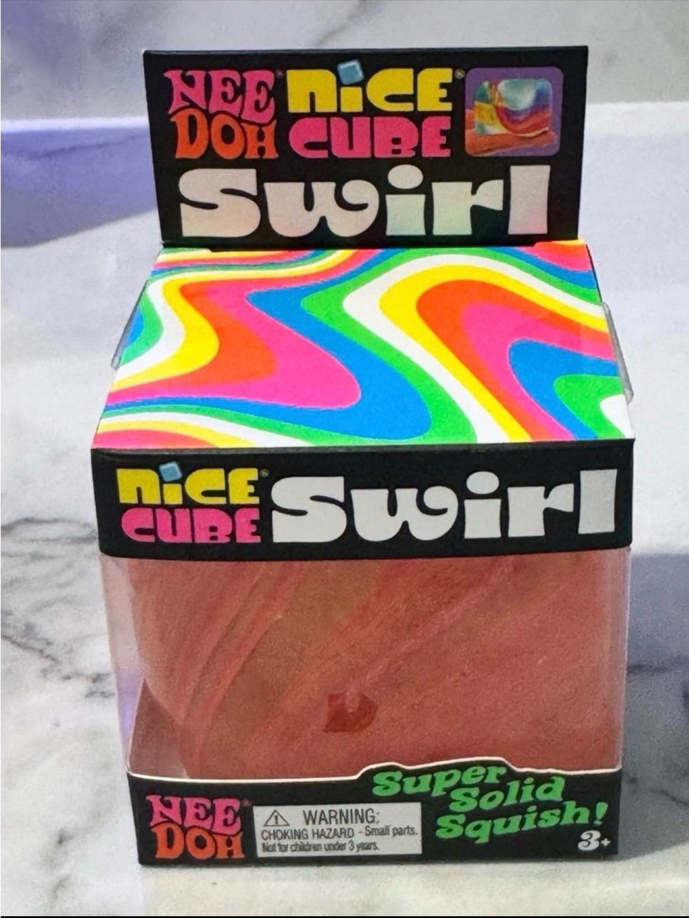 Nee Doh Nice Cube Swirl Super Solid Squish - Pink/Orange Swirl